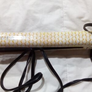 White and Yellow Patterned Hair Farenheit Straightener